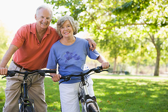 Photo of a man and woman on bicycles. Link to Life Stage Gift Planner Ages 45-65 Situations. Photo of a man and woman on bicycles. Link to Life Stage Gift Planner Ages 45-65 Situations.